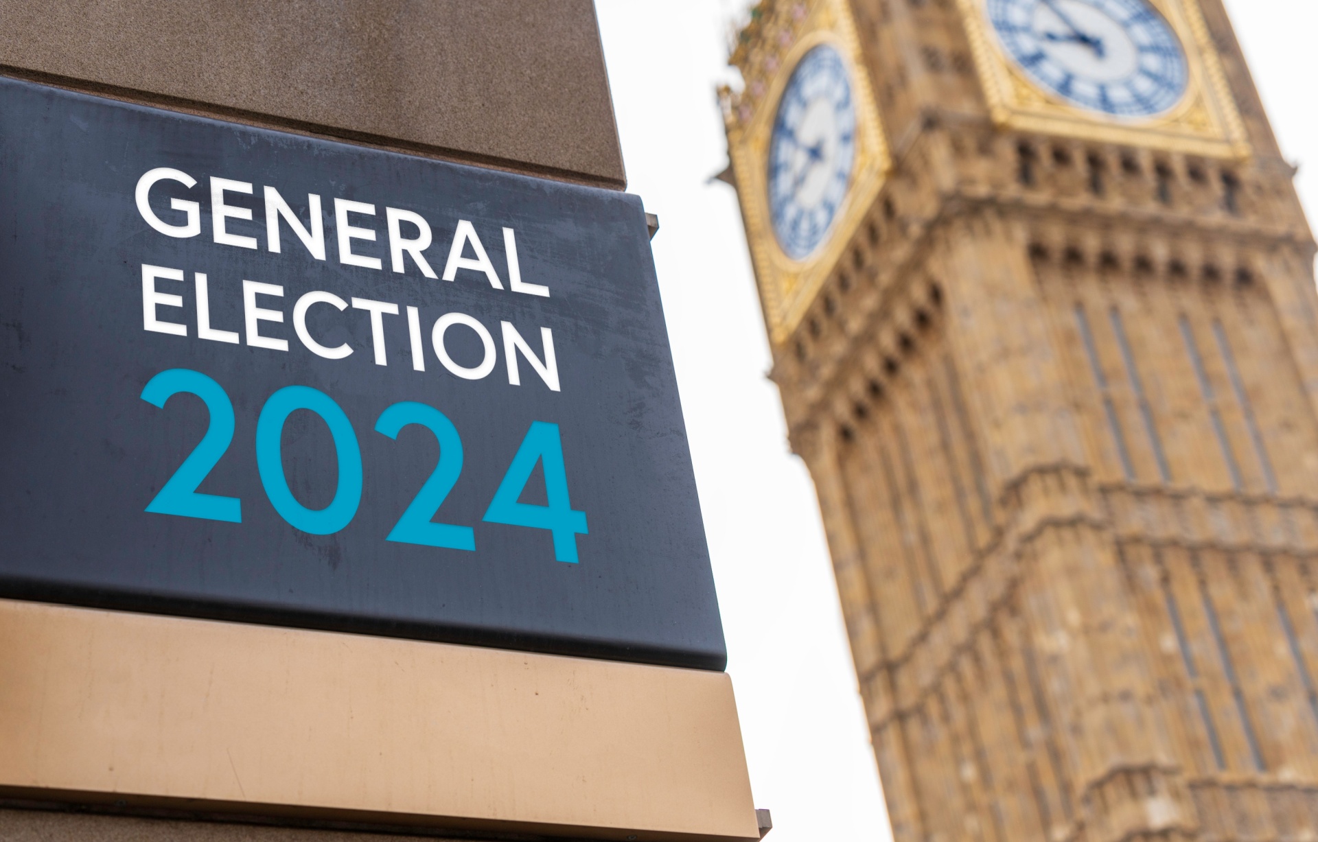 general election sign in front of the Palace of Westminster